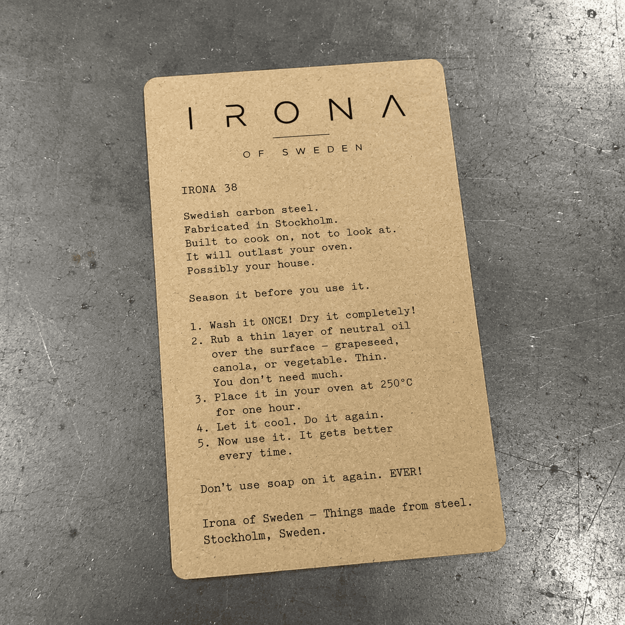 Irona 38 care and seasoning card — hand-finished carbon steel